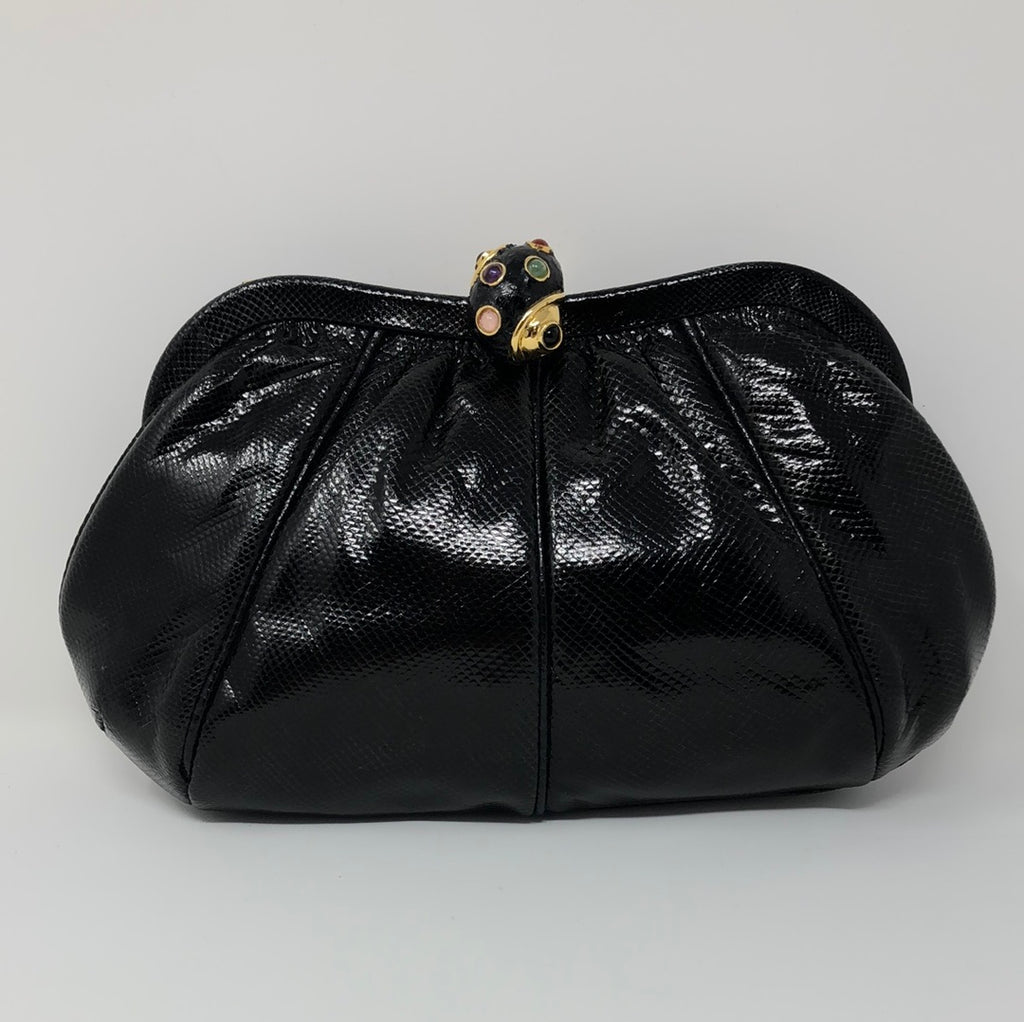 Lot - A Judith Lieber black snake leather purse